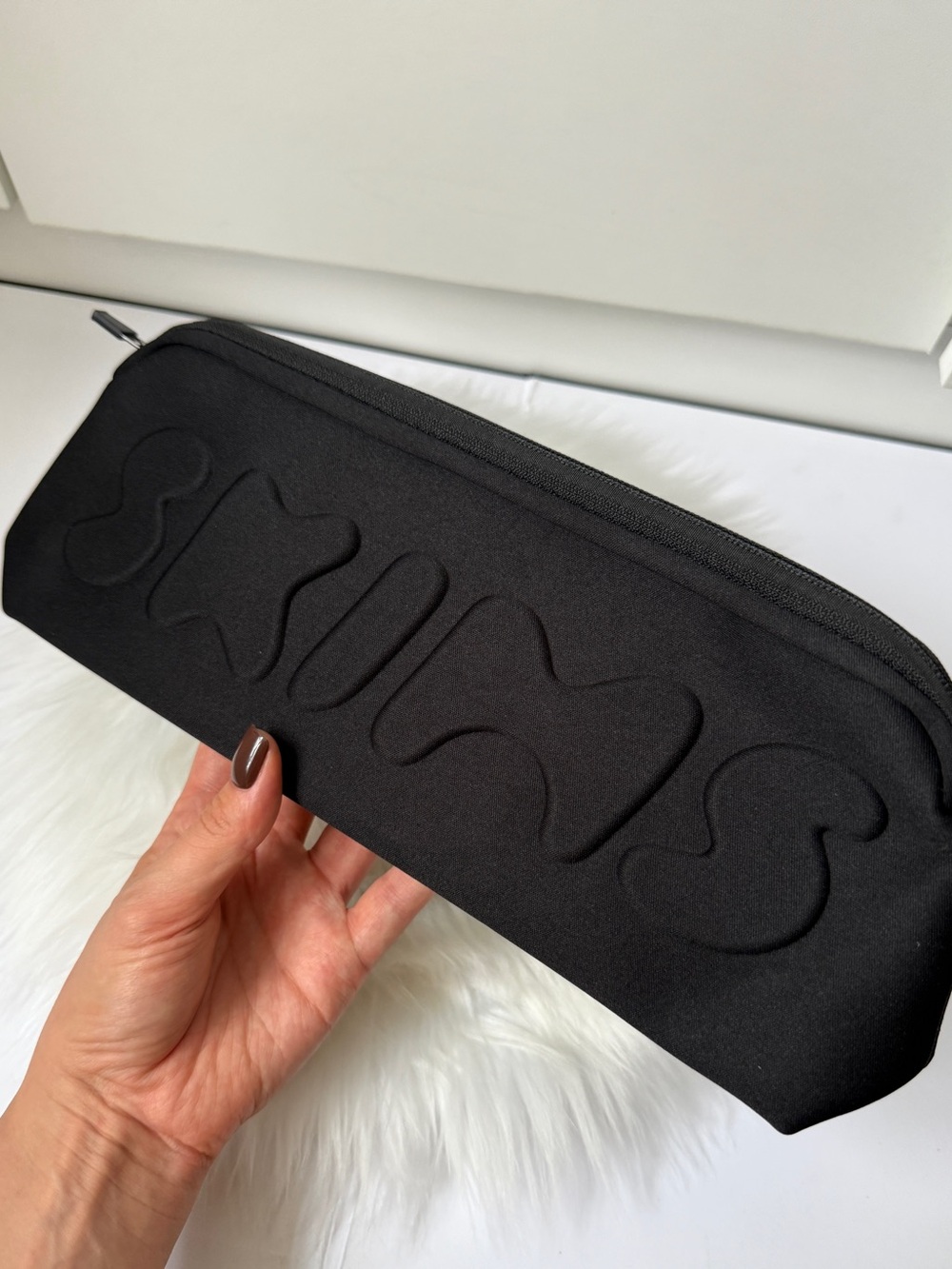 Skims black makeup bag with embossed 'SKIMS' logo New #skims #makeup